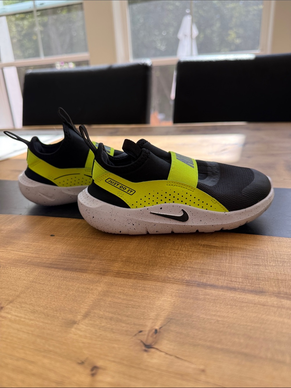 Nike Kids Slip-On Sneakers in Black and Neon Yellow